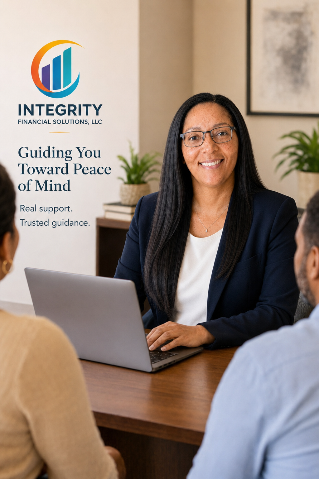 April Warren meeting with clients at her desk